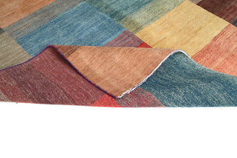 Handknuten Gabbeh Oriental rug by Orientmattor, 237x172 cm, featuring traditional geometric patterns and warm earthy tones.