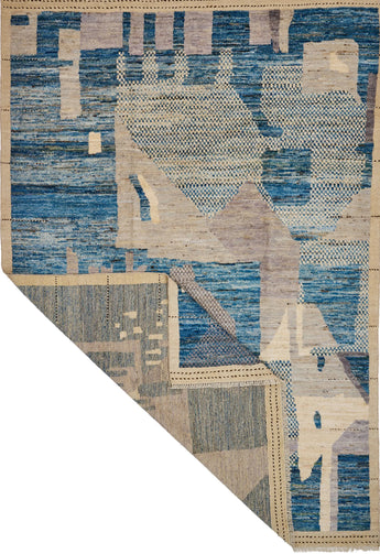 Handwoven Moracco Gabbeh rug by Orientmattor with intricate geometric patterns and rich earthy tones.