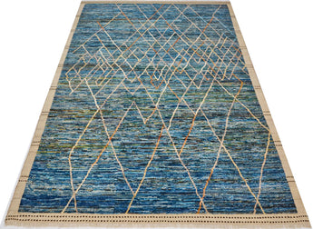 Handwoven Gabbeh rug Moracco No.65989 by Orientmattor, showcasing intricate patterns and warm colors in a close-up shot.