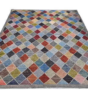 Handwoven Moracco Oriental Gabbeh rug from Orientmattor, 295x250 cm, featuring traditional geometric patterns and rich colors.