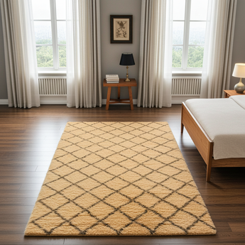 Moroccan Gabbeh rug by Orientmattor with geometric patterns in warm earthy tones, displayed on a wooden floor.