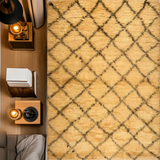 Moroccan Gabbeh rug by Orientmattor featuring traditional geometric patterns and earthy colors, shown in a close-up view.