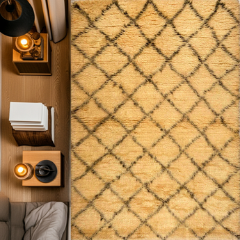 Moroccan Gabbeh rug by Orientmattor featuring traditional geometric patterns and earthy colors, shown in a close-up view.