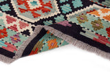 Handwoven Kelim-Chobi Oriental rug by Orientmattor, 199x125 cm, featuring intricate patterns and rich colors in detailed close-up.