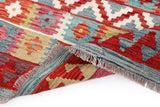 Handwoven Kelim Chobi Oriental rug, 199x149 cm, from Orientmattor, featuring intricate traditional patterns and rich colors.