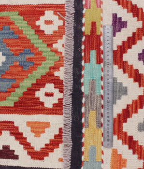 Handwoven Kelim-Chobi Oriental rug by Orientmattor, 243 x 169 cm, detailed geometric patterns on a traditional woven mat.