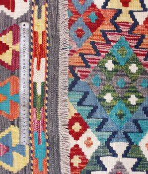 Handwoven Kelim-Chobi Oriental rug by Orientmattor, 245 x 180 cm, showcasing traditional geometric patterns and rich colors.