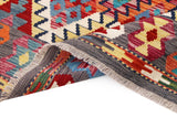 Handwoven Kelim-Chobi Oriental rug by Orientmattor, 245x180 cm, featuring traditional geometric patterns and rich earthy tones.