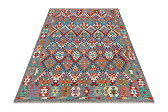 Handwoven Kelim-Chobi Oriental rug by Orientmattor, 245x180 cm, featuring traditional geometric patterns and rich earthy tones.
