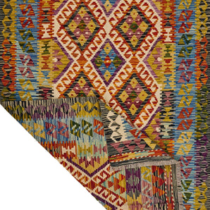 Handwoven Kilim Kelim Chobi rug with geometric patterns, showcasing vibrant colors and traditional craftsmanship.