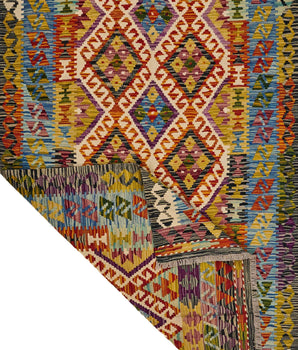Handwoven Kilim Kelim Chobi rug with geometric patterns, showcasing vibrant colors and traditional craftsmanship.