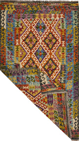 Handwoven Kilim Kelim Chobi rug with geometric patterns, showcasing vibrant colors and traditional craftsmanship.