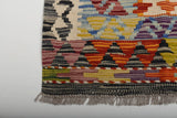 Handwoven Kelim Chobi Kilim rug with geometric patterns, crafted by Orientmattor, shown in intricate details and vibrant colors.