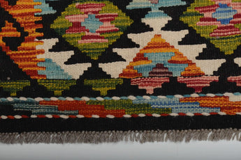 Detailed geometric pattern of Afghan Kilim Chobi wool carpet
