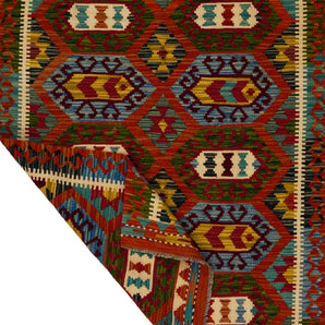 Handwoven Orientmattor Kilim rug Chobi No.65826 with intricate patterns and vibrant colors on a textured surface.