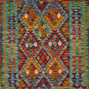 Handwoven Kilim Kelim Chobi rug with intricate patterns, crafted by Orientmattor, showcasing traditional craftsmanship and vibrant colors.