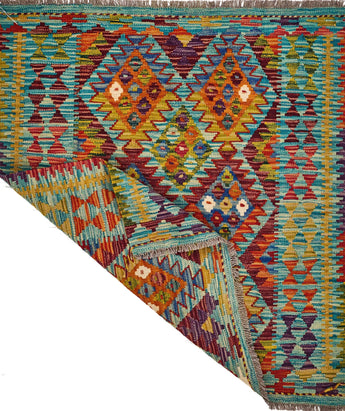 Handwoven Kilim Chobi Kelim rug with intricate patterns, from Orientmattor, featuring traditional craftsmanship and vibrant colors.