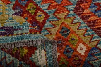 Handwoven Kilim Kelim Chobi rug with intricate geometric patterns, crafted by Orientmattor, showcasing traditional textile artistry.