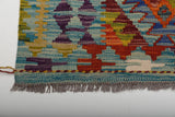 Handwoven Kilim Kelim Chobi rug with intricate geometric patterns, crafted by Orientmattor, showcasing traditional craftsmanship.