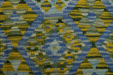 Handwoven Kilim Chobi Kelim rug with intricate geometric patterns, crafted by Orientmattor, shown in a close-up image.