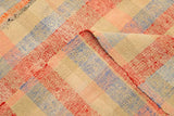 Colorful Orientmattor Kelim Antalia 48148 rug with intricate geometric patterns and vibrant orange, red, and beige tones.