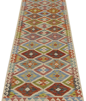 Orientmattor Kelim Chobi 64647 woven rug with geometric patterns, featuring earthy tones and traditional craftsmanship.