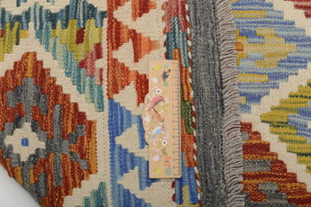 Orientmattor Kelim Chobi 64647 rug with intricate geometric patterns and warm earthy tones, handcrafted textile decor.