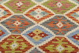 Orientmattor Kelim Chobi 64647 rug with traditional geometric patterns and earthy tones, woven textile decorative floor covering.