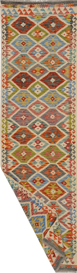 Orientmattor Kelim Chobi 64647 rug with intricate geometric patterns and warm earthy tones, traditional handmade textile.