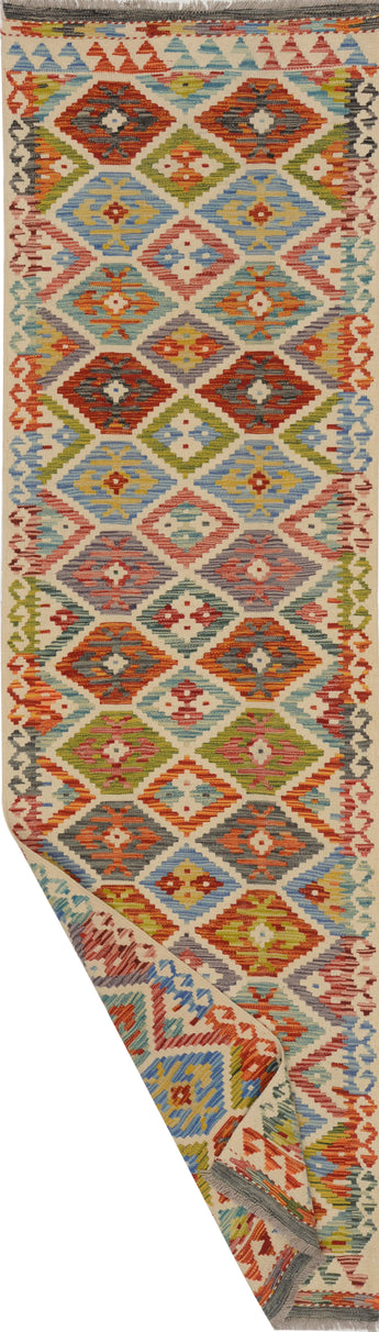 Orientmattor Kelim Chobi 64647 rug with intricate geometric patterns and warm earthy tones, traditional handmade textile.