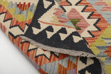 Orientmattor Kelim Chobi rug with intricate geometric patterns, showcasing traditional handwoven craftsmanship.