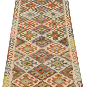 Kelim-Chobi 64660 by Orientmattor featuring intricate patterns and earthy tones in a handwoven textile design.