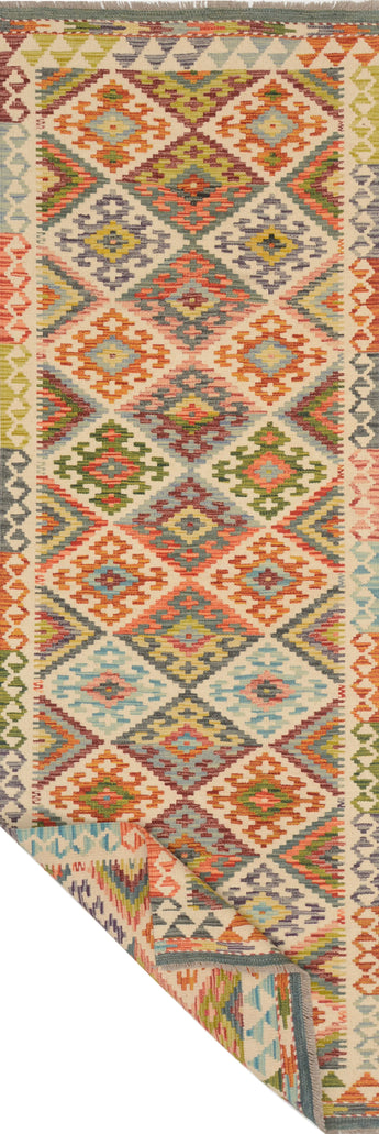 Kelim-Chobi 64660 by Orientmattor featuring intricate patterns and rich colors in a traditional woven design.