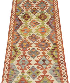 Orientmattor Kelim Chobi 64671 rug with intricate traditional patterns and warm earthy tones, showcasing detailed woven design.
