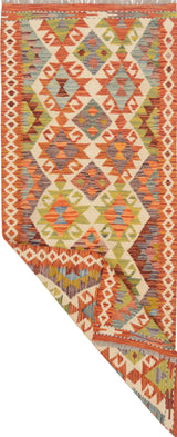 Colorful Orientmattor Kelim Chobi rug with intricate geometric patterns and warm earthy tones, woven with traditional craftsmanship.