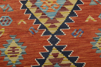 Colorful Kelim Chobi rug from Orientmattor with intricate geometric patterns, showcasing traditional handcrafted textile design.