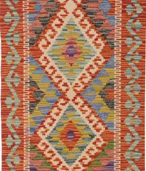 Kelim-Chobi 64729 by Orientmattor showcasing intricate patterns and vibrant colors on a flat-woven rug.