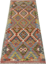 Orientmattor Kelim Chobi 64737 rug with intricate geometric patterns in warm earthy tones, woven with traditional craftsmanship.