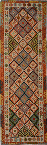 Kelim-Chobi 64743 Kelim rug by Orientmattor with intricate geometric patterns in warm earthy tones.