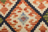 Colorful Orientmattor Kelim Chobi 64743 rug with intricate geometric patterns and traditional design, showcasing vibrant craftsmanship.