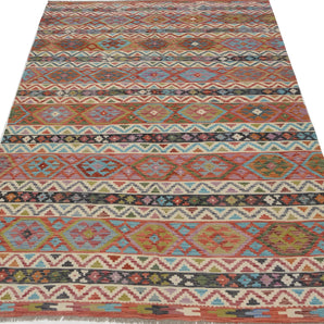 Orientmattor Kelim Chobi 64909 rug with intricate geometric patterns, handmade wool design in warm earthy tones.