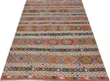 Orientmattor Kelim Chobi 64909 rug with intricate geometric patterns, handmade wool design in warm earthy tones.
