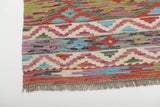 Colorful Orientmattor Kelim Chobi 64909 rug with intricate patterns, traditional handmade design, and vibrant woven details.