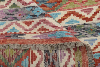 Orientmattor Kelim Chobi 64909 rug featuring intricate traditional patterns in warm earthy tones.