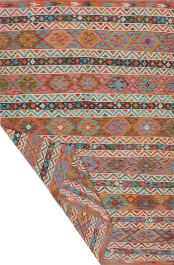 Orientmattor Kelim Chobi 64909 woven rug with intricate geometric patterns in earthy tones, traditional handmade textile.