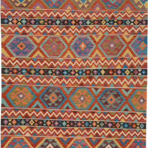 Colorful Orientmattor Kelim Chobi 64921 with intricate geometric patterns on woven textile background.