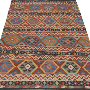 Orientmattor Kelim-Chobi 64921 woven rug with intricate geometric patterns in earthy tones, showcasing traditional craftsmanship.