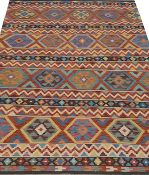 Orientmattor Kelim-Chobi 64921 woven rug with intricate geometric patterns in earthy tones, showcasing traditional craftsmanship.