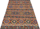Orientmattor Kelim-Chobi 64921 woven rug with intricate geometric patterns in earthy tones, showcasing traditional craftsmanship.