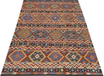 Orientmattor Kelim-Chobi 64921 woven rug with intricate geometric patterns in earthy tones, showcasing traditional craftsmanship.